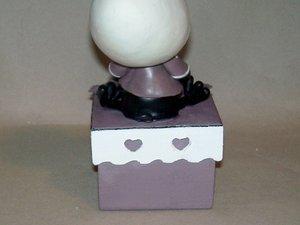 Boite à secret avec Caliméro à ma façon en porcelaine froide Boite à secret avec Caliméro à ma façon en porcelaine froide