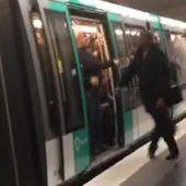 Chelsea fans prevent black man boarding Paris metro train - video