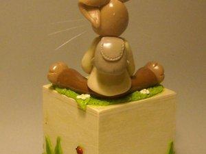 Tirelire avec lapinou en porcelaine froide Tirelire avec lapinou en porcelaine froide