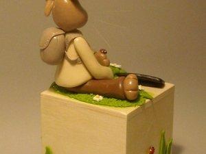 Tirelire avec lapinou en porcelaine froide Tirelire avec lapinou en porcelaine froide