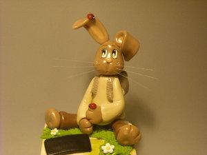 Tirelire avec lapinou en porcelaine froide Tirelire avec lapinou en porcelaine froide