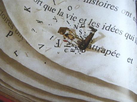 Les Fantastiques livres volants de Morris Lessmore Morris qui tient un livre vogue sur un autre livre dans mon livre ... Je vous avais dit que c'était inception !
