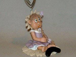 Porte -photo avec bébé fillette en porcelaine froide Porte -photo avec bébé fillette en porcelaine froide