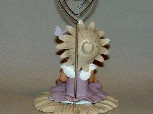 Porte -photo avec bébé fillette en porcelaine froide Porte -photo avec bébé fillette en porcelaine froide