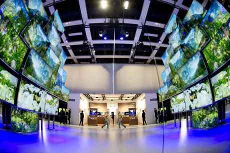 TV screens reflected in a mirror are seen at the Japanese electronics company Panasonic booth at the 53rd IFA electronics trade fair (Internationale Funkausstellung) in Berlin on September 5, 2013. IFA, Europe's largest consumer electronics and home appliances fair opens on September 6 to September 11, 2013.  AFP PHOTO / ODD ANDERSEN