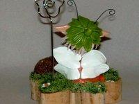 Porte-photo avec p'tite elfe et hérisson en porcelaine froide Porte-photo avec p'tite elfe et hérisson en porcelaine froide