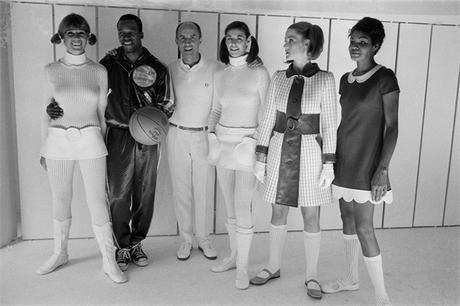 23 Jul 1968, Paris, France --- French fashion designer André Courrèges surrounded by his models. --- Image by © Jack Burlot/Apis/Sygma/Corbis