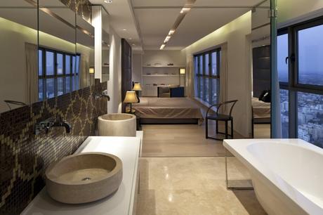 15 Salles de bains fascinantes que vous voulez avoir dans votre chambre à coucher trendy-neutral-bedroom-bathroom-twin-basin