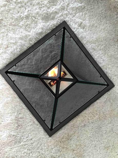 Design-Fireplace-Shaped-Like-the-Louvre-Pyramid-7-900x1200