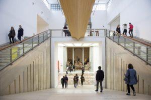 MILAN, ITALY-APRIL 17, 2015: visitors inside the architecture, design and arts museum La Triennale, in Milan - Paolo Bona / Shutterstock