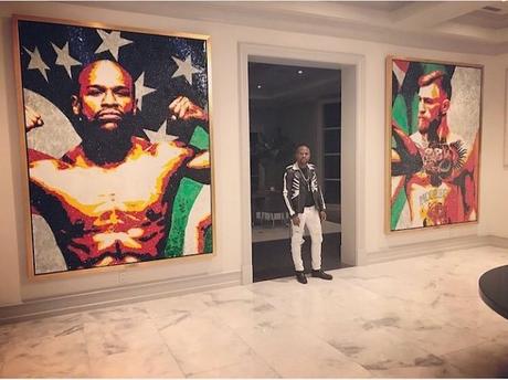 Mayweather affiche un énorme tableau de McGregor chez lui Mayweather affiche un énorme tableau de McGregor chez lui