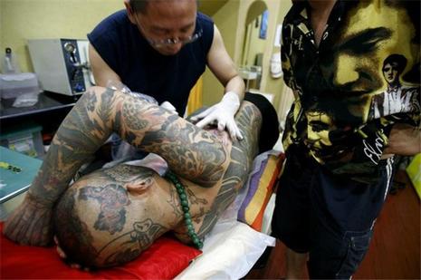 Liu Ming et ses tatouages olympiques