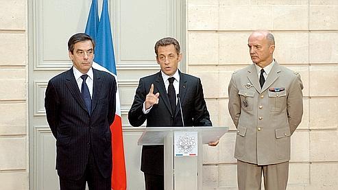 François Fillon, Nicolas Sarkozy et Jean-Louis Georgelin, mardi matin.