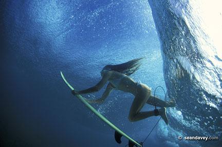 under water view of girl surfer duck-diving at Off The wall, 200