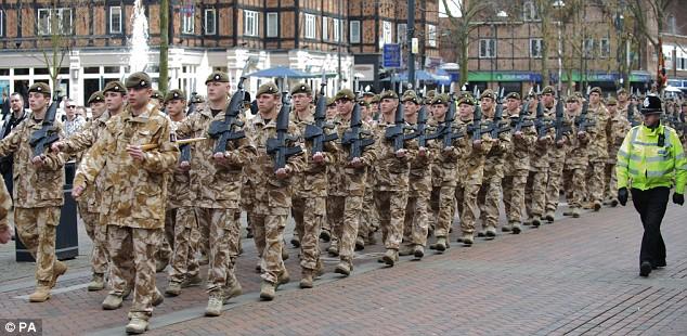 The Royal Anglian Regiment, marching along Watford High St