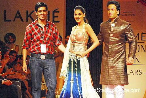 The designer and his muse enjoy the applause