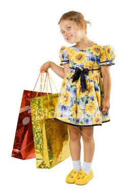 Ist2_4208578-little-girl-with-shopping-bag