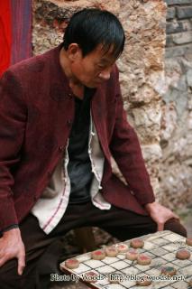 Joueur d'échecs - Lijiang