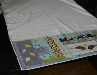 Offrir une serviette pratique pour le nouveau-né!