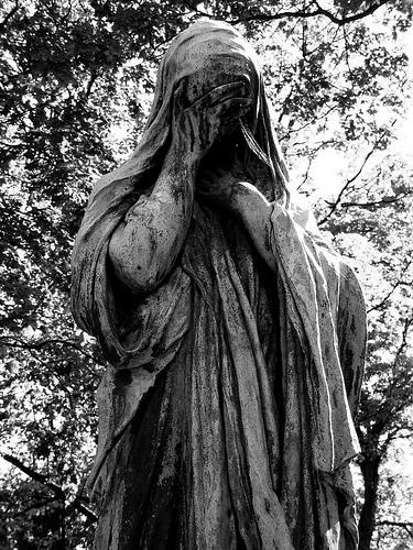 Statue at Pere Lachaise Graveyard in Paris