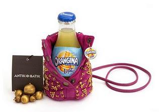 Quand les boissons light courtisent la mode : Antik Batik réalise le sac de la petite bouteille ronde d'Orangina ...
