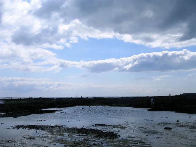 Bagueneau sur l'eau , à  marée dans le canot