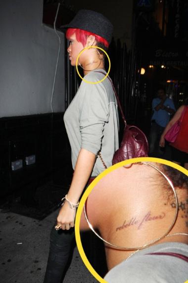 Singer Rihanna takes a break after her NYC concert to get dinner at Phillipe Chow where the redhead showed off her new, misspelled neck tattoo on August 13, 2010 in NYC, NY. Rihanna who has the words rebelle fleur tattooed on her neck clearly missed a lesson in french class as the direct translation of her intended meaning, Rebel Flower would be Fleur Rebelle . This is Rihanna's second misspelled foreign language tattoo, which joins the ranks of her former misspelled Sanskrit tattoo. Fame Pictures, Inc