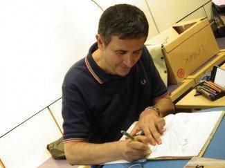 Tito en pleine séance de dédicace, photo MC Poirier