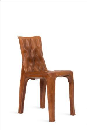 Chaise Capiton François Azambourg, le dur à cuir