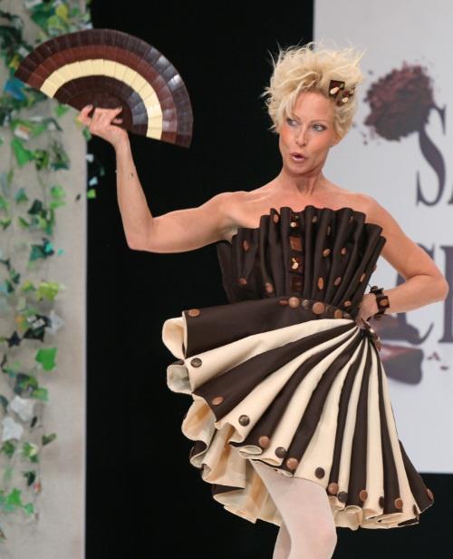 A model wears a creation made with chocolate during a fashion show at the inauguration of the 16th annual Salon du Chocolat in Paris on October 27, 2010. The show, the world's biggest dedicated to chocolate, brings together fashion designers and over 130 chocolatiers from around the world.  UPI/David Silpa. Photo via Newscom