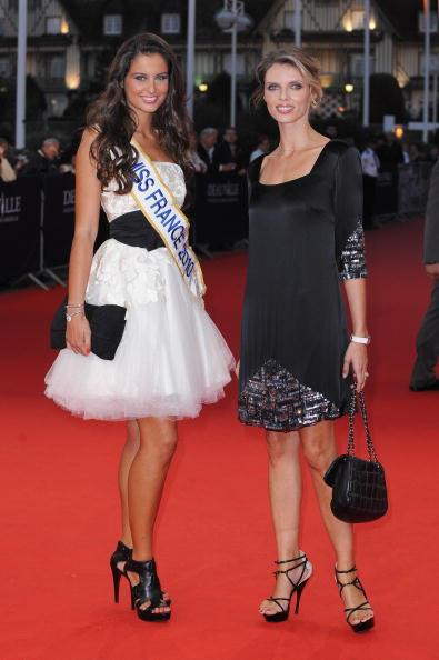 DEAUVILLE, FRANCE - SEPTEMBER 08: Malika Menard Miss France 2010 (L) and Former Miss France and Miss France society new president Sylvie Tellier (R) arrive to attend the premiere of the film 'Love and other impossible pursuits' during the 36th Deauville American Film Festival on September 8, 2010 in Deauville, France. (Photo by Francois Durand/Getty Images)