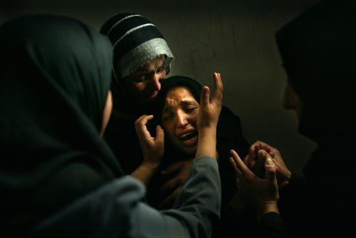 Jerry-Lampen-Netherland-Reuters-Une-Palestinienne-pleure-son-mari----Gaza.jpg