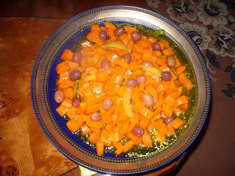 Tajine d'agneau aux carottes, olives rouges et c.confit