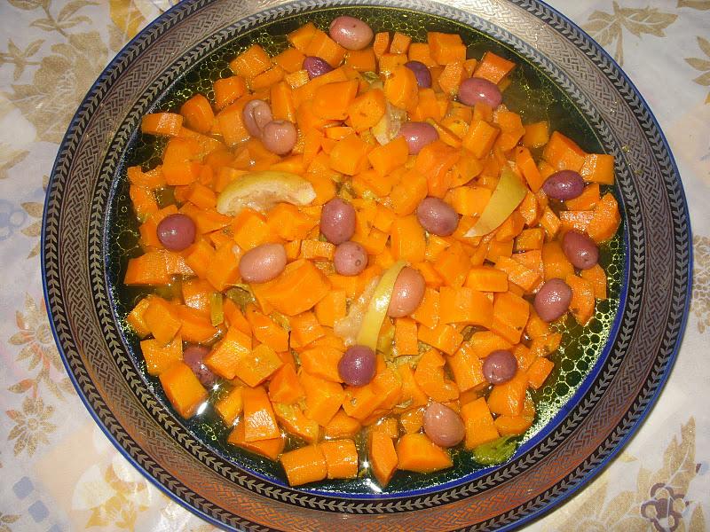 Tajine d'agneau aux carottes, olives rouges et c.confit