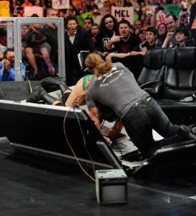 The Game punit Ted DiBiase lors du Raw du 21 mars 2011