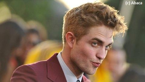 Robert Pattinson... totalement accro à son iPhone