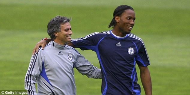 In harmony: Jose Mourinho (left) and Didier Drogba enjoyed success at Chelsea