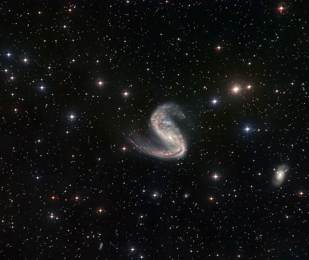 Galaxie spirale asymétrique de l'Hameçon