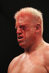 SYDNEY, AUSTRALIA - FEBRUARY 27:  Chris Tuchscherer of the United States bleeds from a cut over his left eye while fighting Mark Hunt of Australia during their heavyweight bout as part of UFC 127 at Acer Arena on February 27, 2011 in Sydney, Australia.  (Photo by Mark Kolbe/Getty Images)