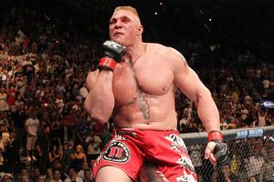 LAS VEGAS - JULY 03:  Brock Lesnar reacts after his second round submission victory against Shane Carwin to win the UFC Heavyweight Championship Unification bout at the MGM Grand Garden Arena on July 3 2010 in Las Vegas Nevada.  (Photo by Josh Hedges/Zuffa LLC/Zuffa LLC via Getty Images)