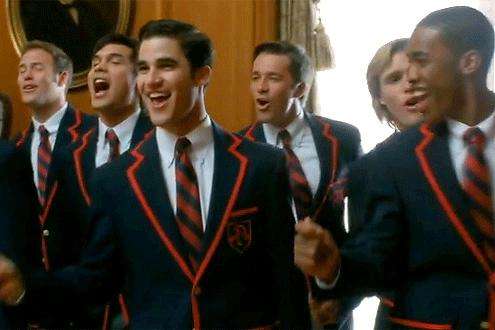 http://cdn.idolator.com/wp-content/uploads/2011/03/Glee-Darren-Criss-as-Blaine-with-Dalton-Academy-Warblers-Teenage-Dream.gif