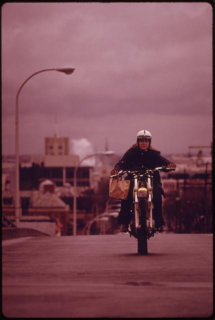 Motorcycles Came Out of Summer Vacation Retirement During the Fuel Crisis in the Pacific Northwest During the Fall of 1973. This Person Is Riding in Portland 11/1973