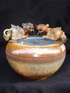 Les fontaines aux Pi Xiu