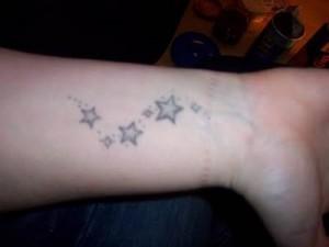 small star wrist tattoos
