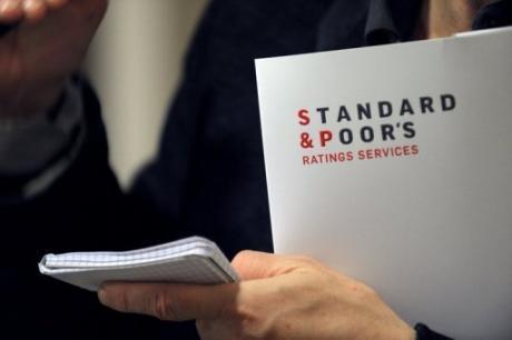 [Europe - Banksters] La police italienne perquisitionne le siège milanais de Standard & Poor’s – Libération