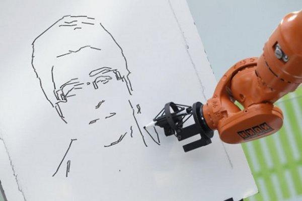 robot artist Un robot dessine un portrait en trois minutes