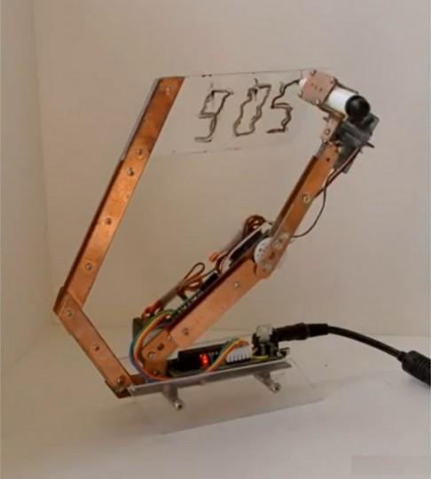 doodle clock 486x540 Doodle Clock, un robot capable décrire et deffacer lheure