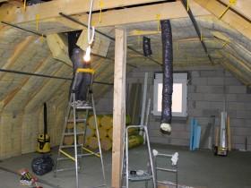 Aménager ses combles : Isolation de sous-toiture avec des panneaux de laine Isover Isoconfort 35 200MM