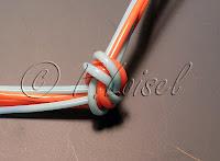 Scoubidou à 4 fils, depart au milieu des fils