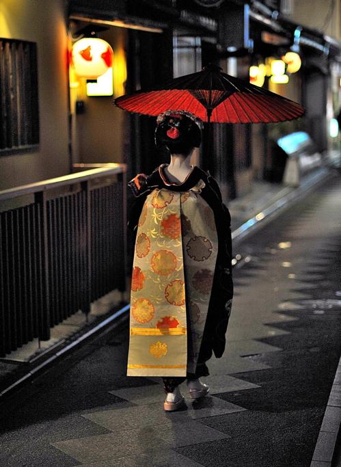 Maiko with red umbrella